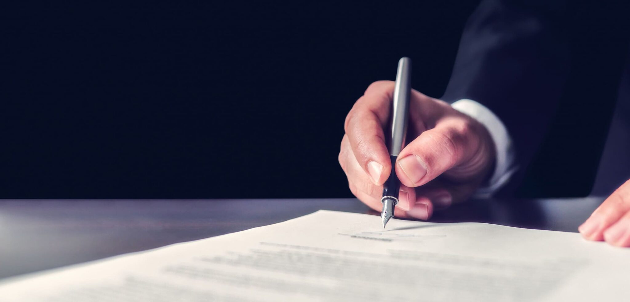 North Carolina personal injury settlement paperwork being signed