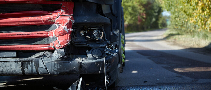 A truck with a damaged front