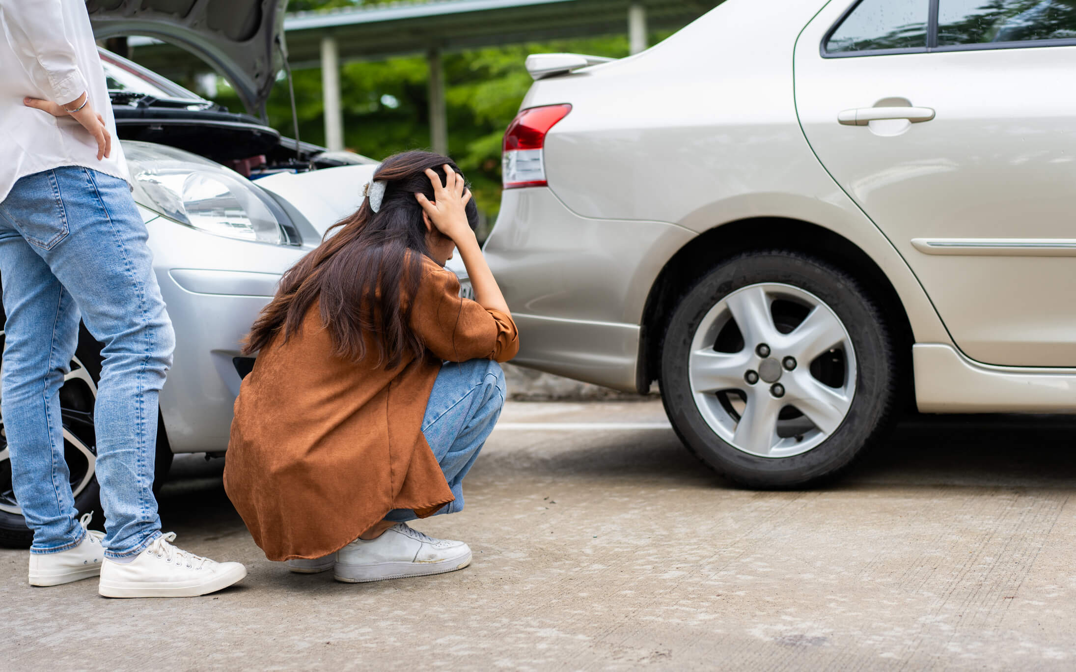 Woman freaking out over a car accident