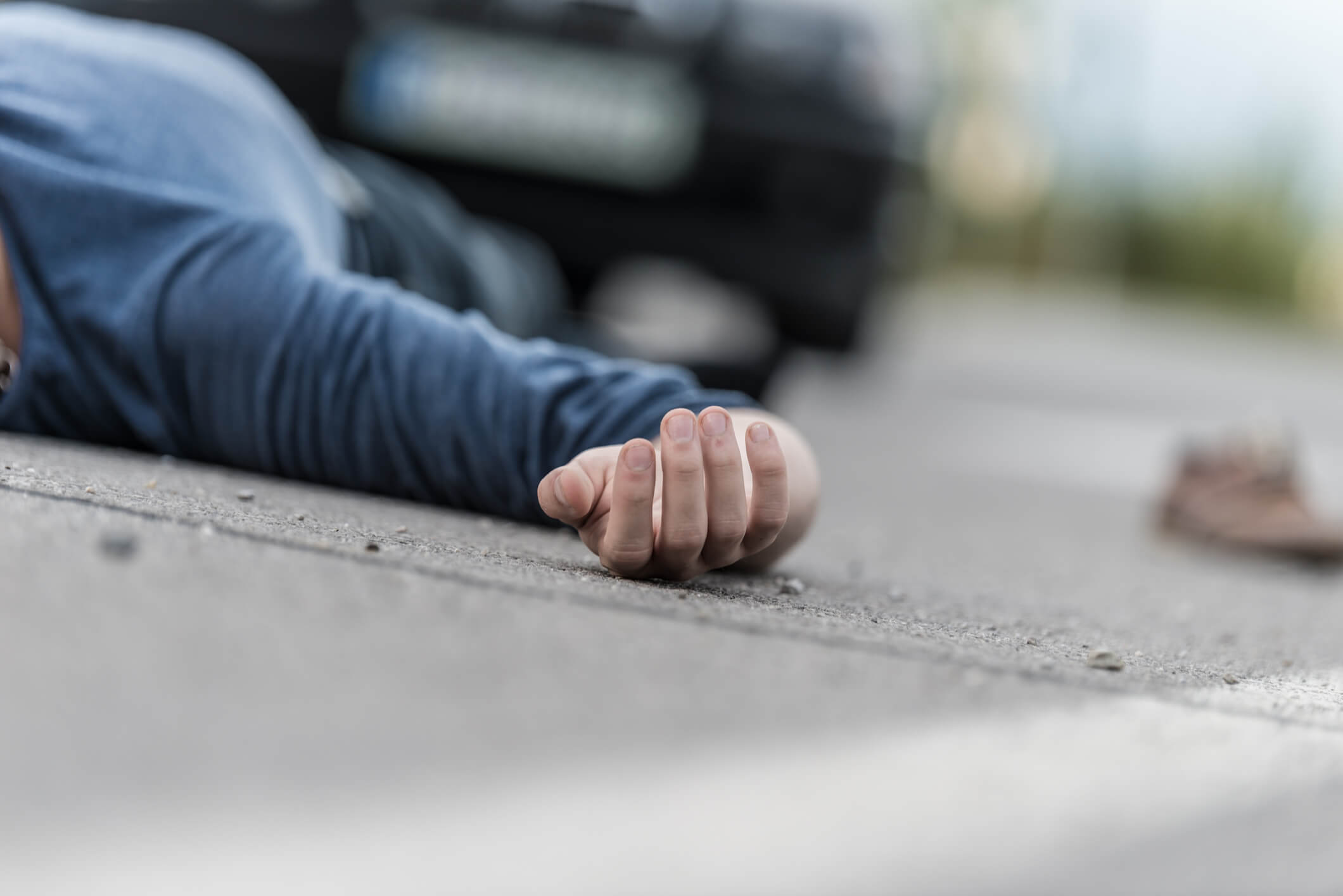 Traffic accident.Young man hit by a car